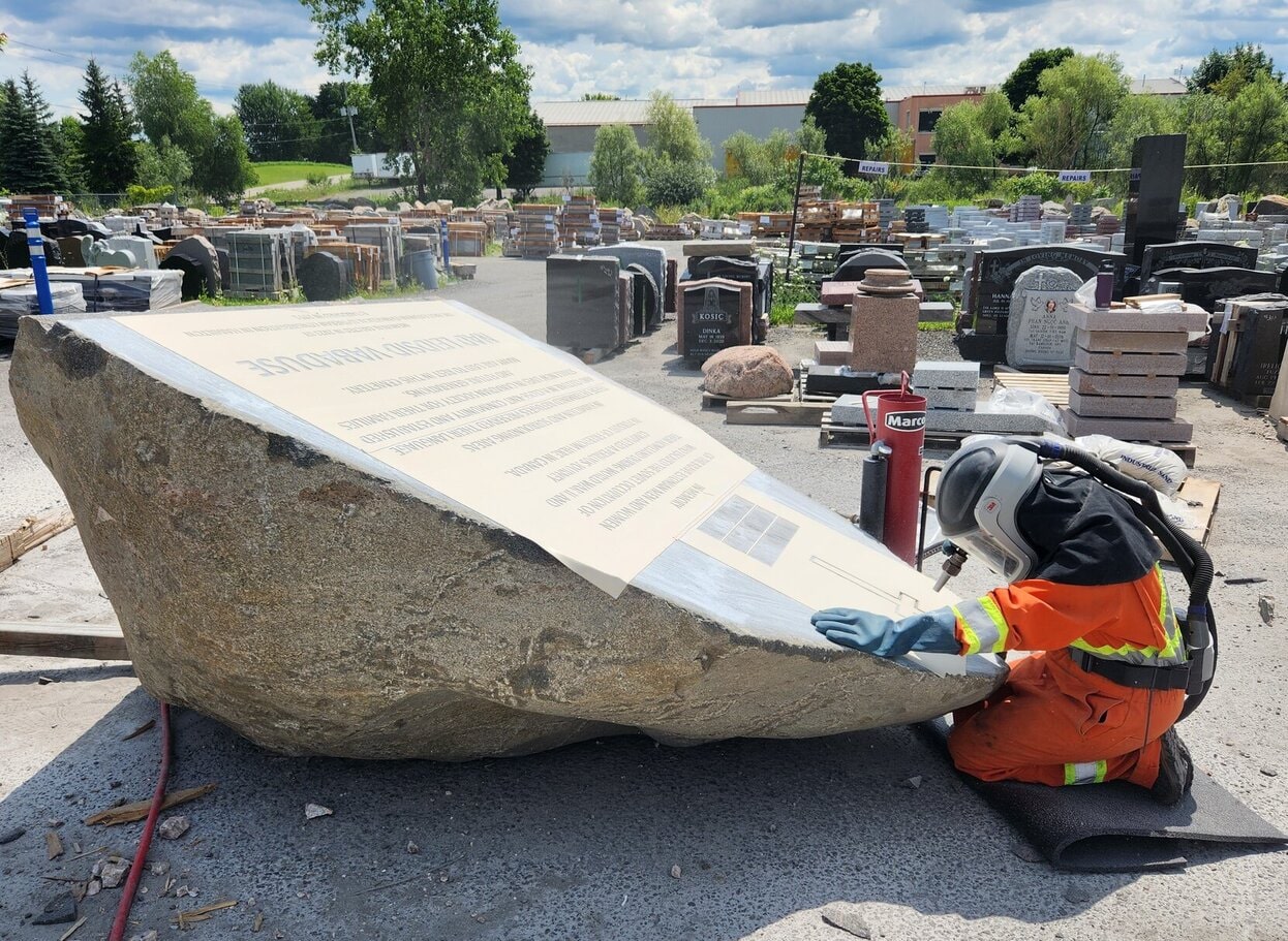 engraving a granite boulder