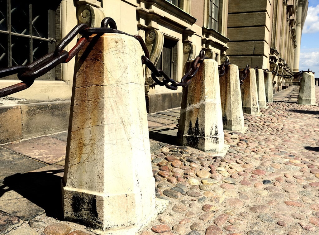 cobblestone path and stone pillars